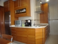 cocina-pvc-madera-encimera-granito