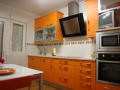 Ildefonso Matanza_cocina_pvc_naranja-encimera_silestone