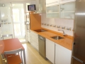 Ildefonso Matanza_cocina_formica_blanca-encimera_silestone_naranja